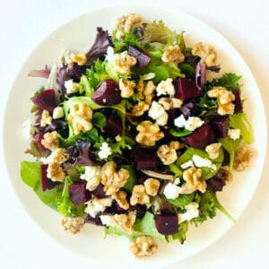 Roasted-Beet-Salad-with-Goat-Cheese-and-Candied-Walnuts-on-plate