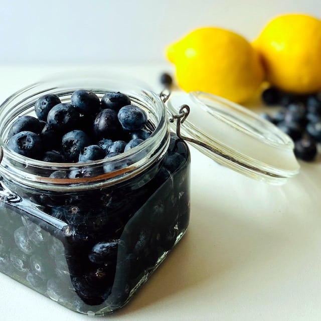 blueberry-vodka-in-jar-lemons-and-blueberries-in-background