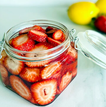Strawberry-Vodka-in-jar-lemons-in-background