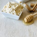 manuka-honey-butter-in-dish-with-honey-dipper