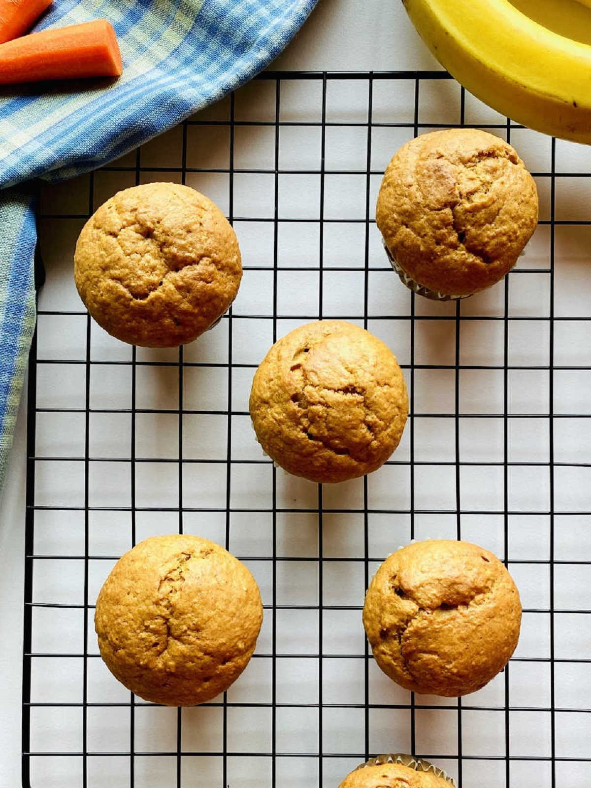 banana carrot muffins on cooling rack
