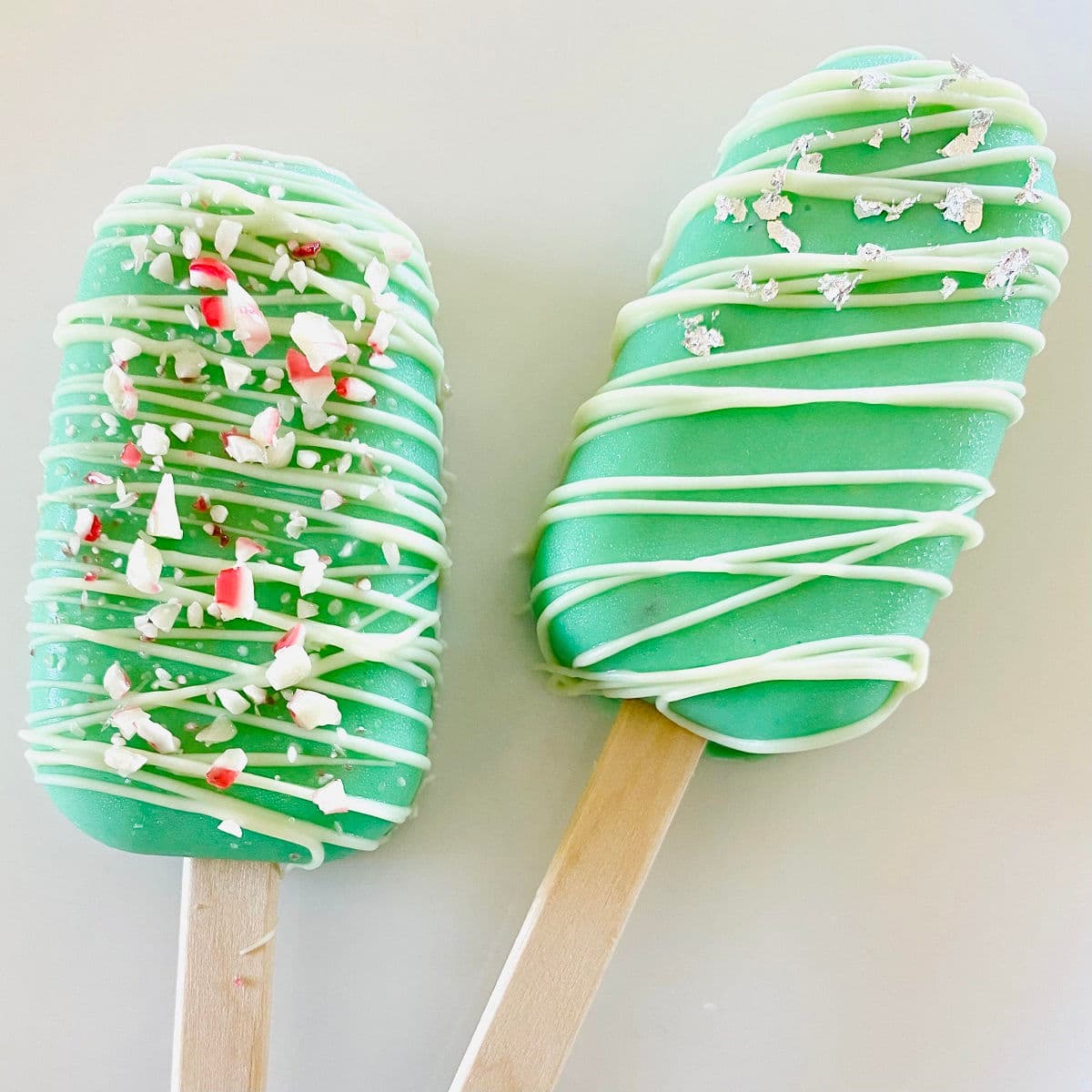 two holiday cake popsicles