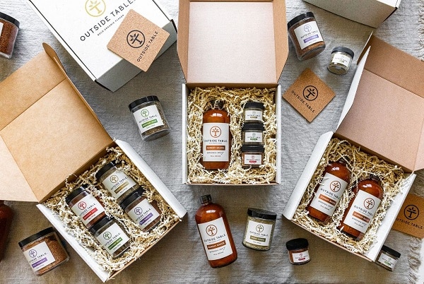 multiple gift boxes of outside table sauces and seasonings