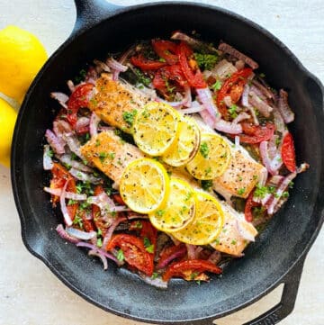 baked salmon in cast iron skillet.